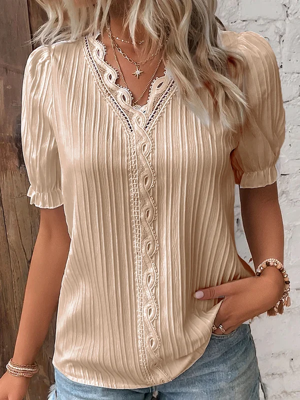 Elegante top in pizzo con scollo a V