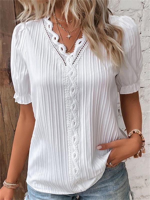 Elegante top in pizzo con scollo a V